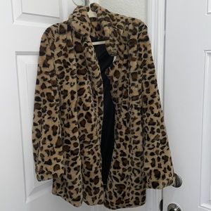 Faux fur cheetah print coat size large. Never worn